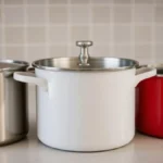 Stainless Steel vs Ceramic vs Enamel Stockpots: Which Material Is Best for Large Families? 4 Various stockpot materials showing stainless steel, ceramic, and enamel options side by side