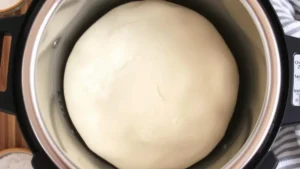 Bread dough rising in pressure cooker on yogurt setting